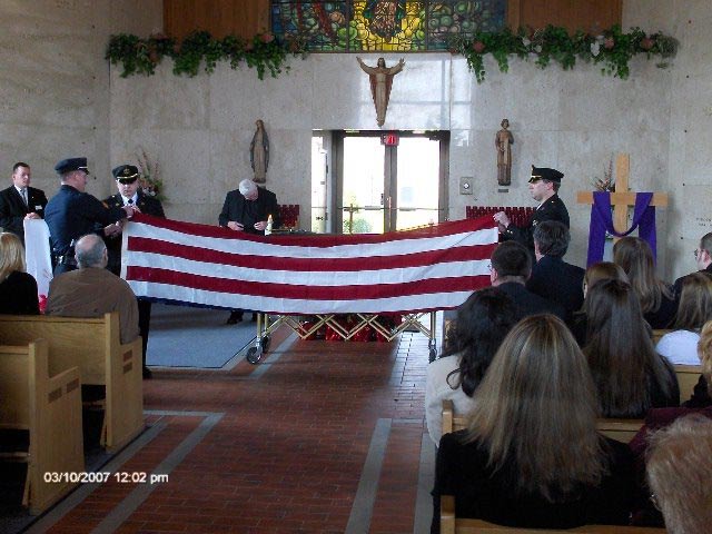Flag folding ceremony at Terry's funeral