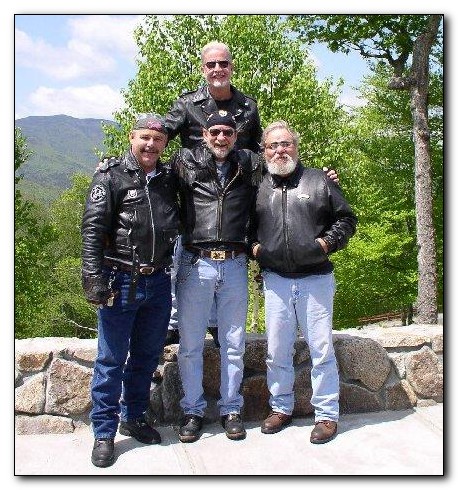 Terence Connelly poses in Laconia New Hampshire with biker buddies Ron Shute, Treat Wells and Ray Ruiz