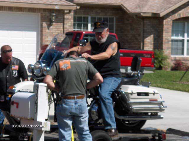 Norm, Bert and Larry loading Terry's bike for the trip back to Jersey