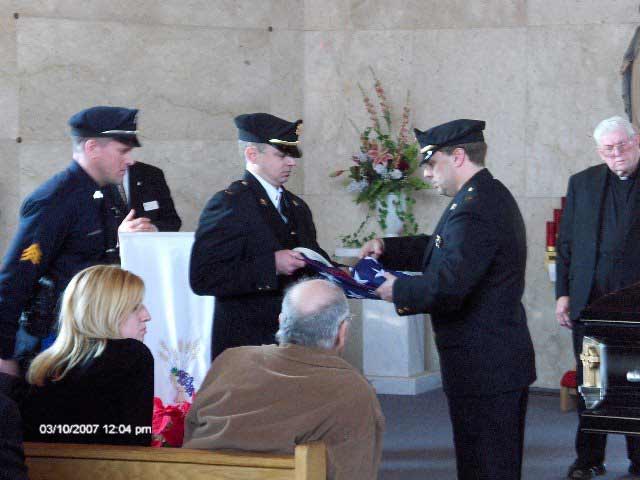 Flag presentation to Darlene Connelly