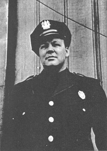Harold Vecander in Camden police uniform, outdoor photograph