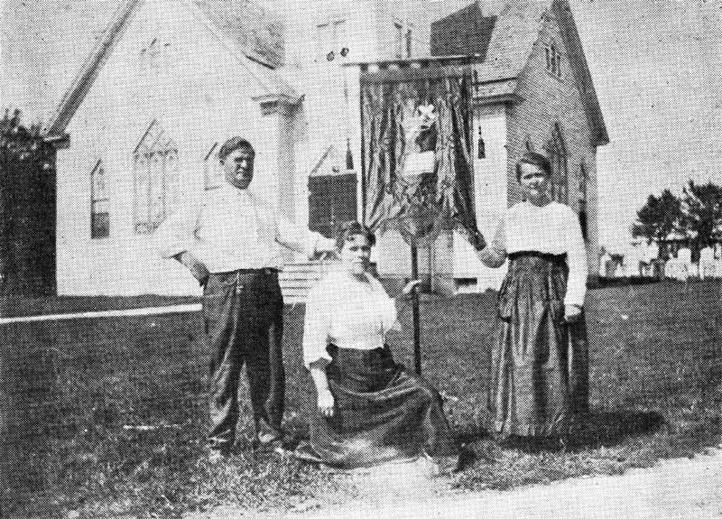 Rev. Hackett's first charge at Dividing Creek, N.J., with Mrs. Hackett and the Evangelist, Mrs. Wells Berry