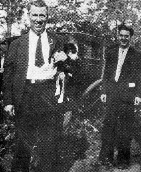 The late Mr. William Doughton (holding dog), who cooked the first Children's Breakfast at Wiley Church, which started the mission work