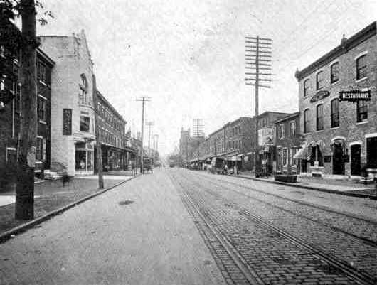 Market Street Looking West from 6th — Tall building on right is the Temple Theater