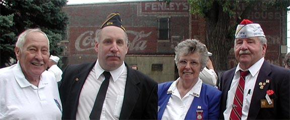 Rohna Survivor Tony Bushur, Phil Cohen, Carol Moore VFW Ladies Auxiliary #2159, Robert Moore, President VFW Post #11468
